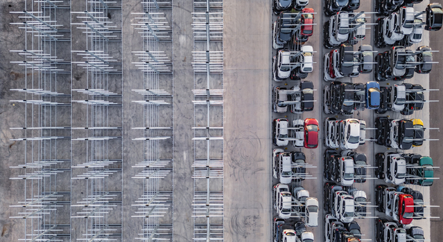 Livron sur Drome France 20 June 2026 Aerial view of an automated car storage system with rows of vehicles stacked in metal racks at a facility. Livron sur Drome France 20 June 2026 Aerial view of an automated car storage system with rows of vehicles stacked in metal racks at a facility.