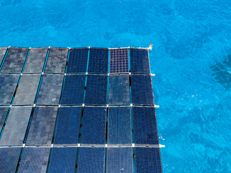 Aerial view of the SolarSea floating solar power plant by Swimsol on turquoise ocean water in Dharavandhoo Baa Atoll Maldives. Aerial view of the SolarSea floating solar power plant by Swimsol on turquoise ocean water in Dharavandhoo Baa Atoll Maldives.