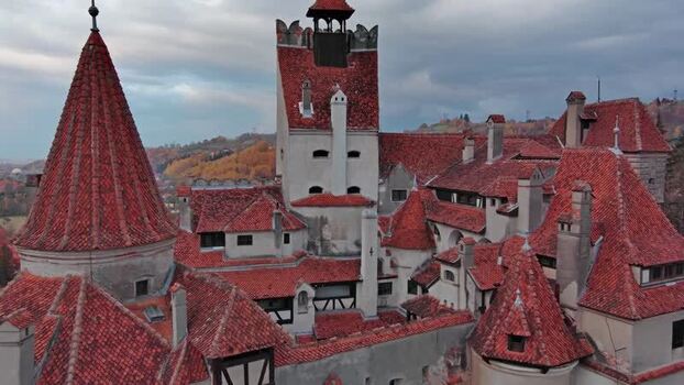 Aerial view of Bran Castle with red tiled roofs Romania. Aerial view of Bran Castle with red tiled roofs Romania.