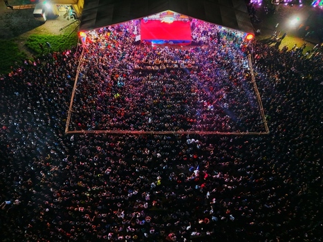 Dhaka Bangladesh 20 July 2026 Aerial view of Mohsin Hall Playground filled with a massive crowd attending an outdoor night concert under bright stage lights. Dhaka Bangladesh 20 July 2026 Aerial view of Mohsin Hall Playground filled with a massive crowd attending an outdoor night concert under bright stage lights.