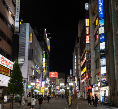 Shinjuku City Japan 30 September 2025 View of the vibrant Shinjuku street alive with neon signs casting a colorful glow on the bustling night crowd. Shinjuku City Japan 30 September 2025 View of the vibrant Shinjuku street alive with neon signs casting a colorful glow on the bustling night crowd.