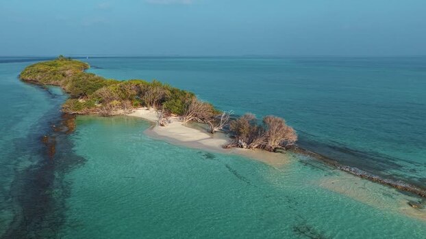 Aerial view of a tropical island and turquoise sea Maldives. Aerial view of a tropical island and turquoise sea Maldives.