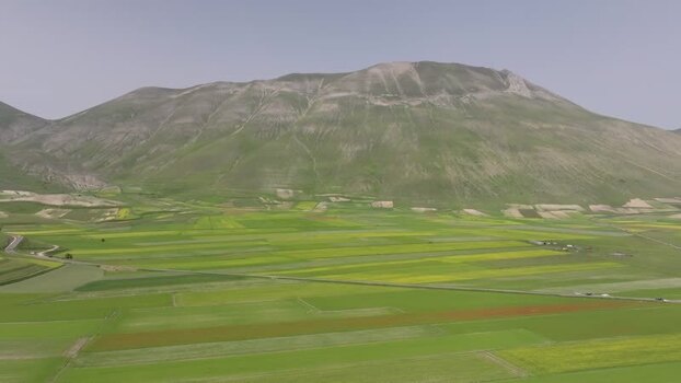 Aerial view of Castelluccio di Norcia fields Italy.