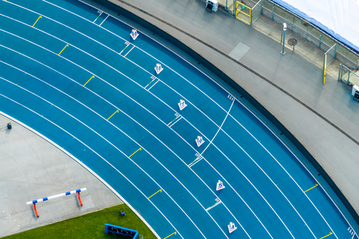 Aerial view of the blue running track at the athletic stadium in Chorzow Wojewodztwo slaskie Poland.