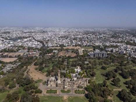 Vadodara India 14 March 2026 Aerial view of Laxmi Vilas Palace with its intricate Indo Saracenic architecture sprawling green gardens and the dense urban skyline of Vadodara under a clear sky. Vadodara India 14 March 2026 Aerial view of Laxmi Vilas Palace with its intricate Indo Saracenic architecture sprawling green gardens and the dense urban skyline of Vadodara under a clear sky.
