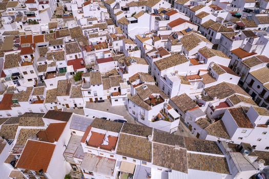 Aerial view of the white houses with terracotta roofs in the historic town of Olvera Andalusia Spain. Aerial view of the white houses with terracotta roofs in the historic town of Olvera Andalusia Spain.