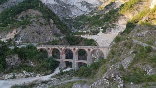Aerial view of marble railway viaduct in Carrara Italy. Aerial view of marble railway viaduct in Carrara Italy.