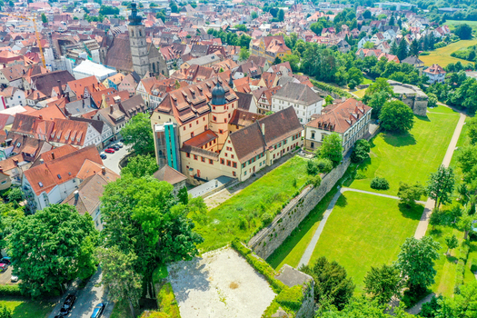 Aerial view of Forchheim Castle featuring historic architecture and red tiled roofs in Forchheim Bayern Germany. Aerial view of Forchheim Castle featuring historic architecture and red tiled roofs in Forchheim Bayern Germany.