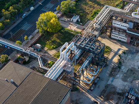 Aerial view of the Heizkraftwerk Klingenberg combined heat and power plant featuring industrial piping and infrastructure in Berlin Berlin Germany. Aerial view of the Heizkraftwerk Klingenberg combined heat and power plant featuring industrial piping and infrastructure in Berlin Berlin Germany.