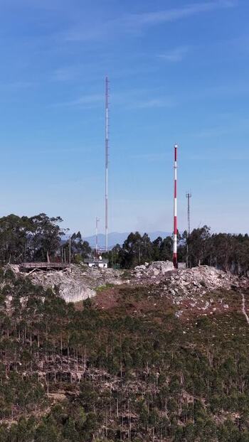 Aerial view of radio towers on hill Portugal.