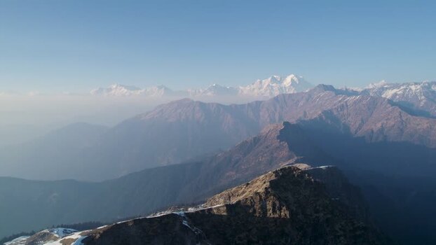 Aerial view of Himalayan peaks and rocky ridges India.