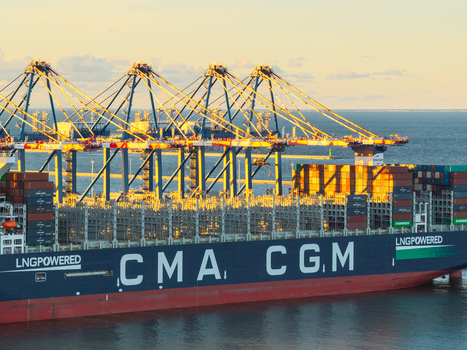 Gdansk Poland 23 September 2026 Aerial view of the Baltic Hub container terminal with a large CMA CGM container ship docked alongside massive gantry cranes during the golden hour. Gdansk Poland 23 September 2026 Aerial view of the Baltic Hub container terminal with a large CMA CGM container ship docked alongside massive gantry cranes during the golden hour.
