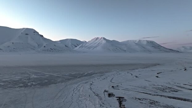 Aerial view of snowy mountains near Longyearbyen Svalbard and Jan Mayen. Aerial view of snowy mountains near Longyearbyen Svalbard and Jan Mayen.