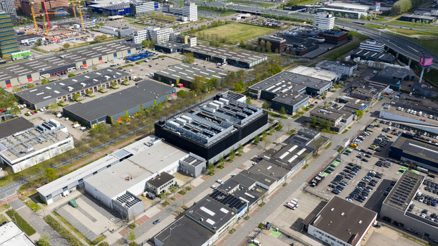 Amsterdam Netherlands 19 April 2026 Aerial view of the Equinix Data Center and surrounding industrial buildings with flat rooftops and parking lots in the Amstel III district. Amsterdam Netherlands 19 April 2026 Aerial view of the Equinix Data Center and surrounding industrial buildings with flat rooftops and parking lots in the Amstel III district.