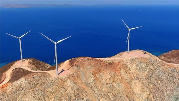 Aerial view of wind turbines on a rocky hill Greece. Aerial view of wind turbines on a rocky hill Greece.