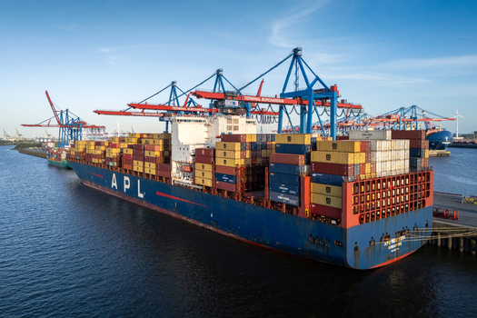 Hamburg Germany 26 April 2026 Aerial view of HHLA Container Terminal Burchardkai with a large APL container ship docked under massive gantry cranes in the port of Hamburg. Hamburg Germany 26 April 2026 Aerial view of HHLA Container Terminal Burchardkai with a large APL container ship docked under massive gantry cranes in the port of Hamburg.