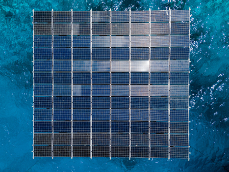 Aerial view of the SolarSea floating solar power plant by Swimsol on turquoise water in Dharavandhoo Baa Atoll Maldives. Aerial view of the SolarSea floating solar power plant by Swimsol on turquoise water in Dharavandhoo Baa Atoll Maldives.