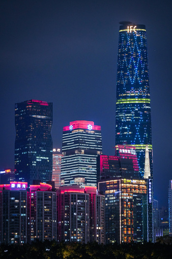 Guangzhou Guangdong Province China 22 February 2024 View of the illuminated Guangzhou International Finance Center and surrounding skyscrapers in the city skyline at night. Guangzhou Guangdong Province China 22 February 2024 View of the illuminated Guangzhou International Finance Center and surrounding skyscrapers in the city skyline at night.