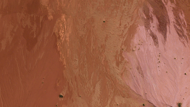 Aerial view of the textured landscape featuring vibrant salt lake deposits shifting sand patterns and industrial mining formations in Kalbarri Western Australia Australia. Aerial view of the textured landscape featuring vibrant salt lake deposits shifting sand patterns and industrial mining formations in Kalbarri Western Australia Australia.