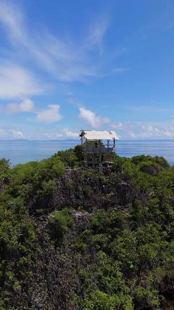 Aerial view of Rufas Home Stay on a tropical hill Indonesia.