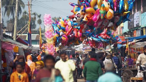 View of a crowded street market with colorful balloons Bangladesh. View of a crowded street market with colorful balloons Bangladesh.