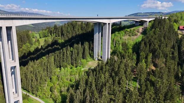 Aerial view of Lavanttal Bridge and green forests Austria. Aerial view of Lavanttal Bridge and green forests Austria.