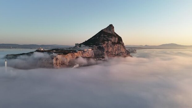 Aerial view of the Rock of Gibraltar above clouds Gibraltar.