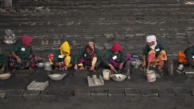 View of women workers in a traditional foundry Bangladesh.