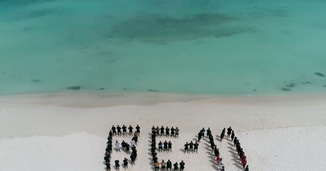 Aerial view of people on the beach in Los Roques Venezuela.