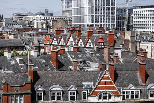 Aerial view of the historic rooftops and chimneys of Newcastle upon Tyne England United Kingdom. Aerial view of the historic rooftops and chimneys of Newcastle upon Tyne England United Kingdom.