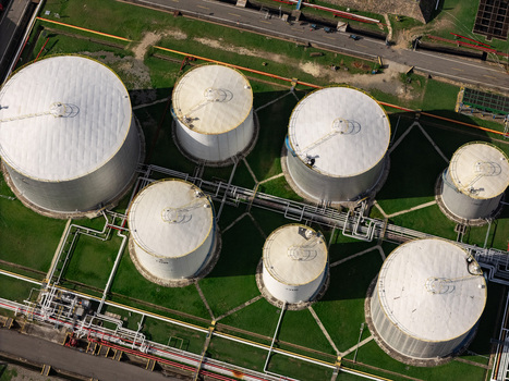 Aerial view of industrial oil storage tanks situated within a facility in Bajos de Haina San Cristobal Province Dominican Republic.
