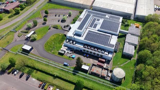 Aerial view of a data center with solar panels United Kingdom. Aerial view of a data center with solar panels United Kingdom.