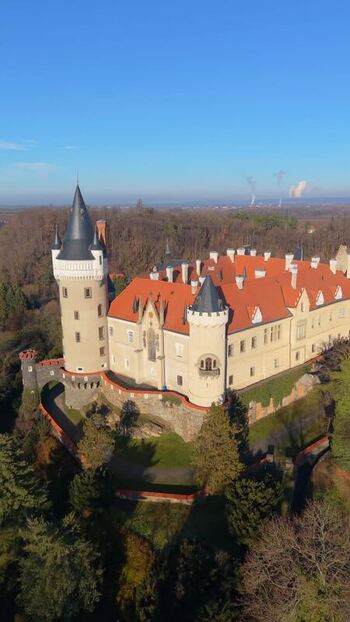 Aerial view of Zleby Castle and its historic towers Czechia.
