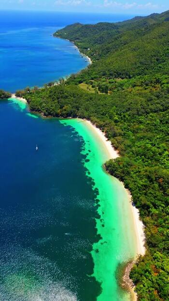 Aerial view of the tropical coastline of Guanaja Honduras. Aerial view of the tropical coastline of Guanaja Honduras.