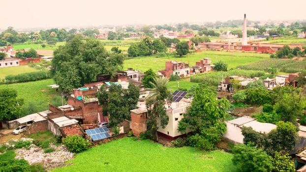 Aerial view of solar panels on rooftops in Lucknow India.