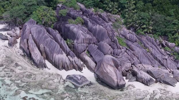 Aerial view of Anse Reunion granite boulders Seychelles.