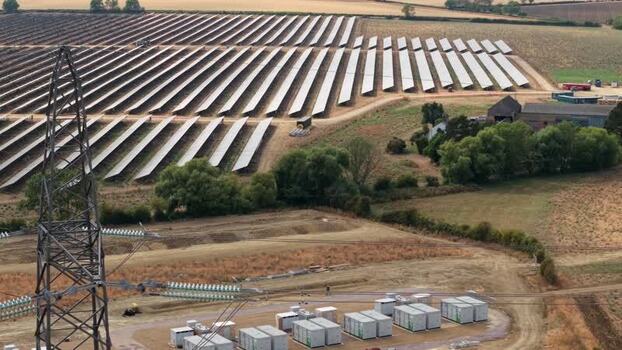 Aerial view of Eaton Socon solar farm and battery storage United Kingdom. Aerial view of Eaton Socon solar farm and battery storage United Kingdom.