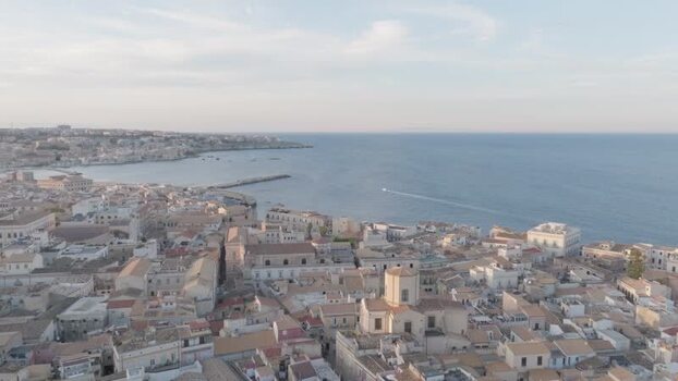 Aerial view of the Island of Ortigia and historic rooftops Italy. Aerial view of the Island of Ortigia and historic rooftops Italy.