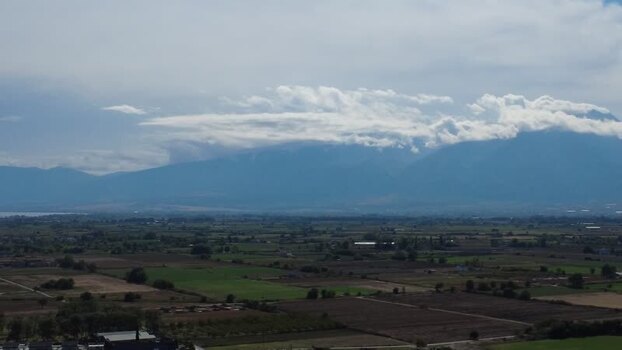 Aerial view of Mount Olympus and plains in Greece.