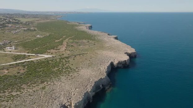 Aerial view of Plemmirio rocky cliffs and coastline Italy.