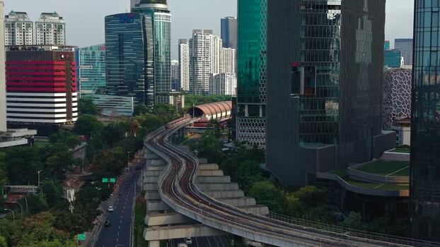 Aerial view of Jakarta skyscrapers and train tracks Indonesia.