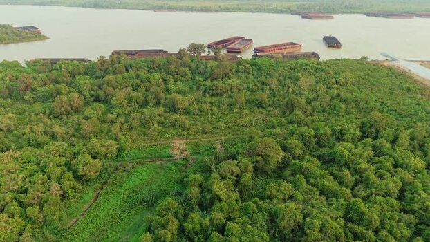 Aerial view of Delta Mahakam barges in Anggana Indonesia.