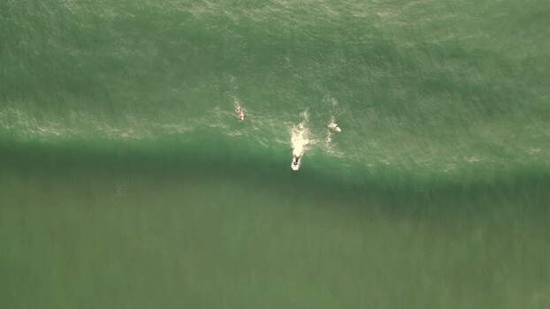 Aerial view of surfers at Praia da Mata Portugal. Aerial view of surfers at Praia da Mata Portugal.