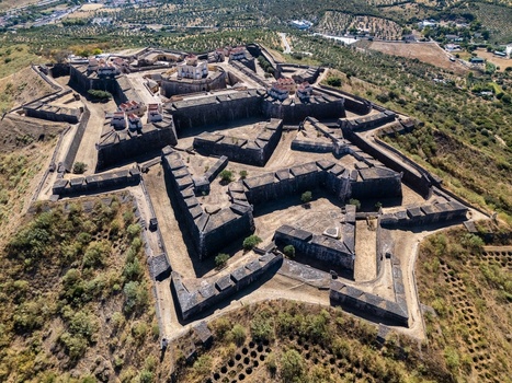 Elvas Portugal 10 September 2026 Aerial view of the star shaped Forte de Nossa Senhora da Graca featuring its historic stone fortifications bastions and central courtyard. Elvas Portugal 10 September 2026 Aerial view of the star shaped Forte de Nossa Senhora da Graca featuring its historic stone fortifications bastions and central courtyard.