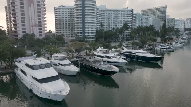 Aerial view of luxury yachts in a Miami Beach marina United States.