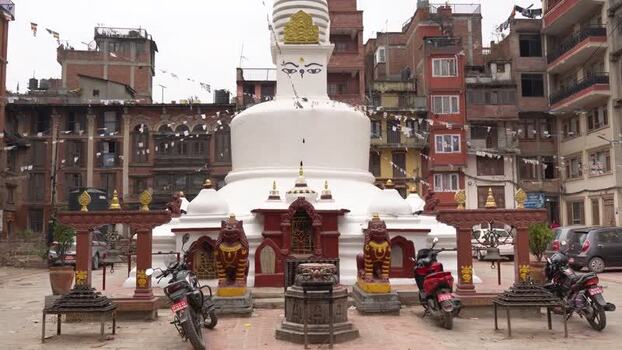View of a white stupa with Buddha eyes in Kathmandu Nepal.