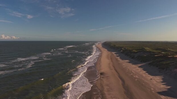 Aerial view of Lyngvig Fyr Strand coastline Denmark.