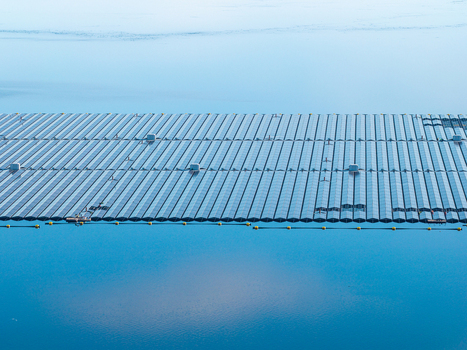 Aerial view of the floating solar park on Cottbuser Ostsee a former open pit mine showing rows of solar panels on the water surface in Cottbus Brandenburg Germany. Aerial view of the floating solar park on Cottbuser Ostsee a former open pit mine showing rows of solar panels on the water surface in Cottbus Brandenburg Germany.