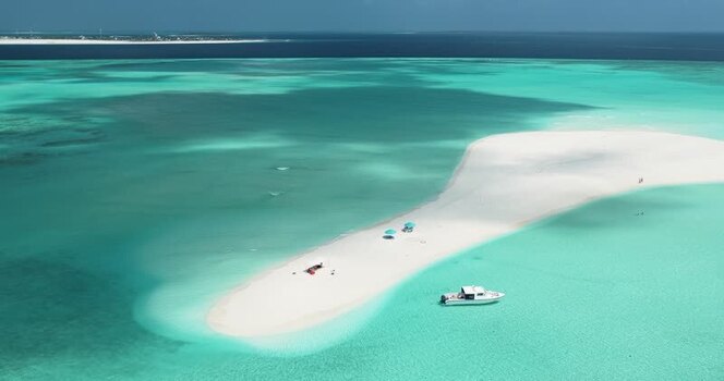Aerial view of a white sandbank and boat in Dhidhdhoo Maldives. Aerial view of a white sandbank and boat in Dhidhdhoo Maldives.