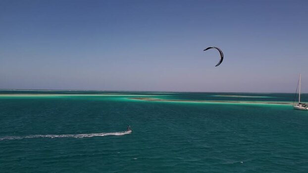 Aerial view of kitesurfer in Los Roques archipelago Venezuela.